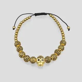 دستبند اسکلتی نگین دار مدل Gold Skulls کد Stdt-419d1