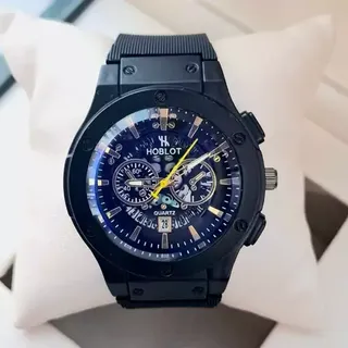 ساعت مچی مردا�نه (پسرانه) هابلوت Hublot تقویم دار عقره ایی بند سیلیکات مشکی موتور نمایان طرح دو موتوره عقربه طلایی کد2738