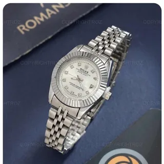 ساعت مچی زنانه رولکس ROLEX مدل 1975 نقره ای تقویم دار بهمراه جعبه و باطری اضافه 