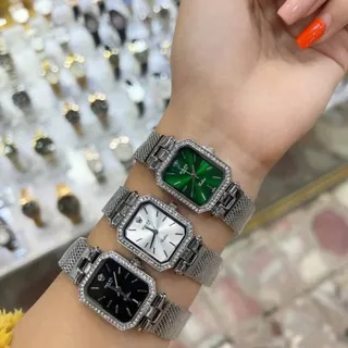 ساعت زنانه رولکس صفحه مستطیلی دور نگینی بند طلایی و نقره �ایی – Rolex